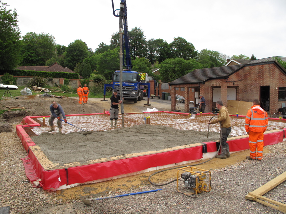 Raking out the concrete