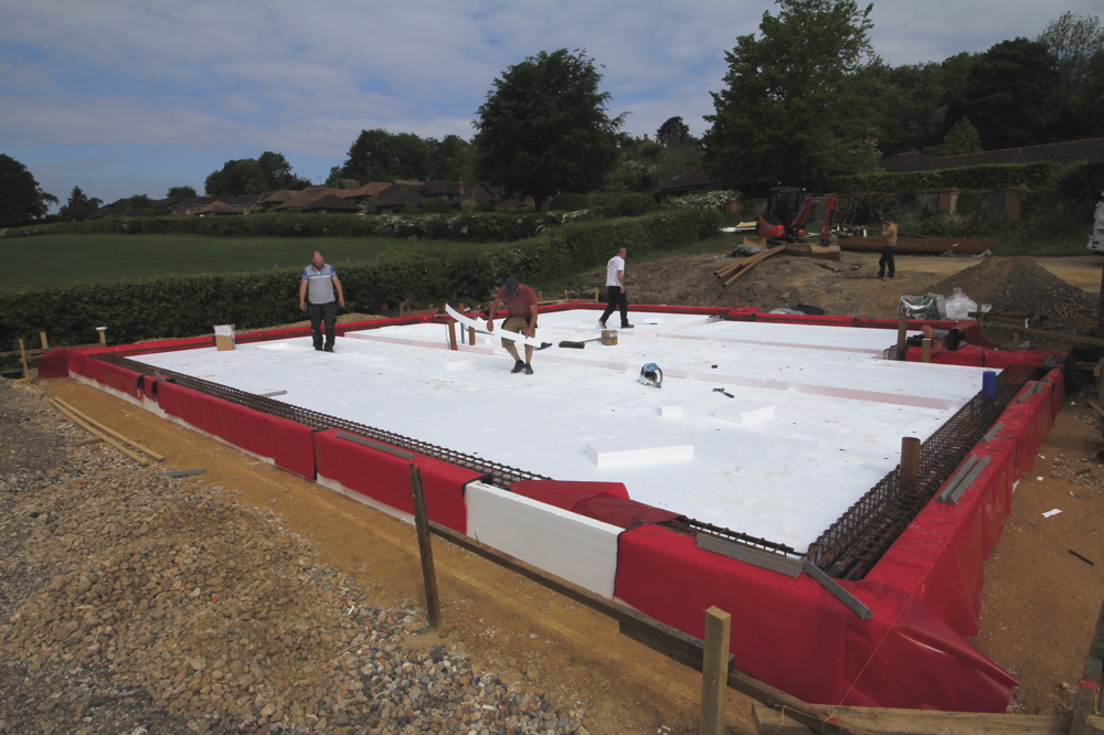 Laying second layer of insulation