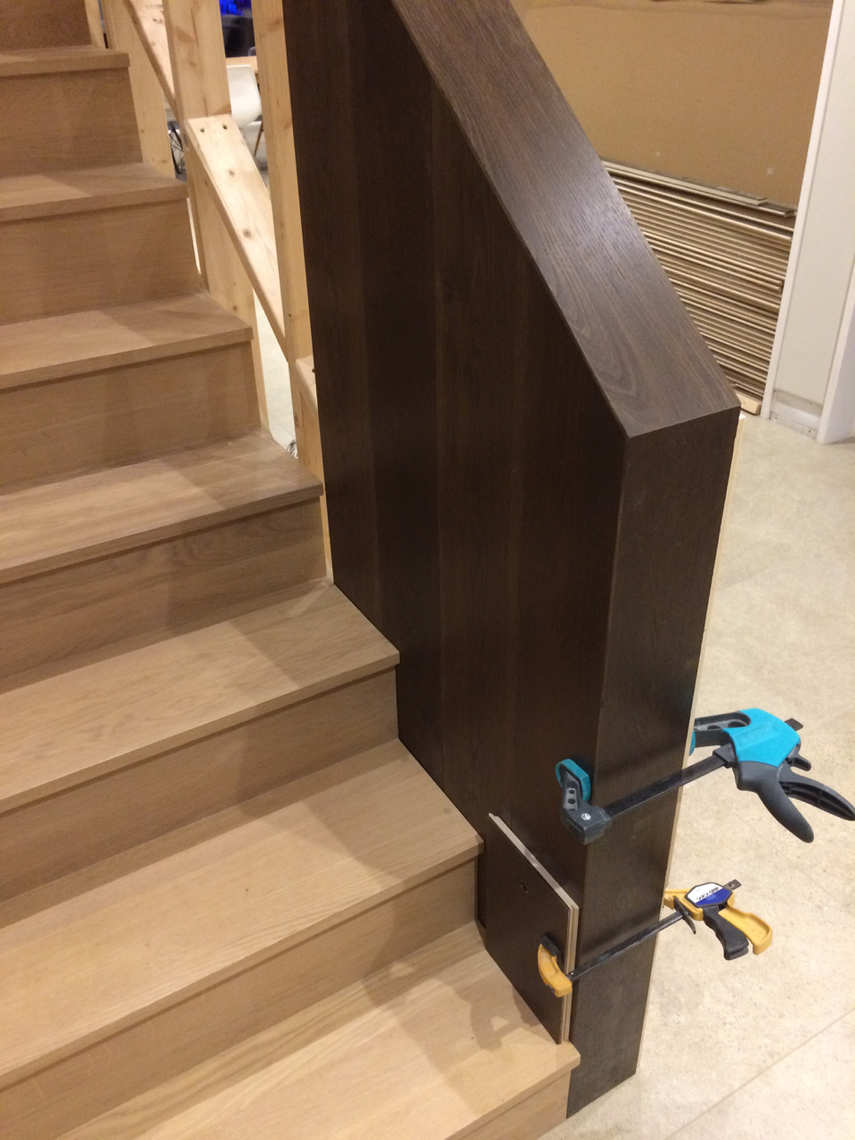 Fixing cladding to balustrade