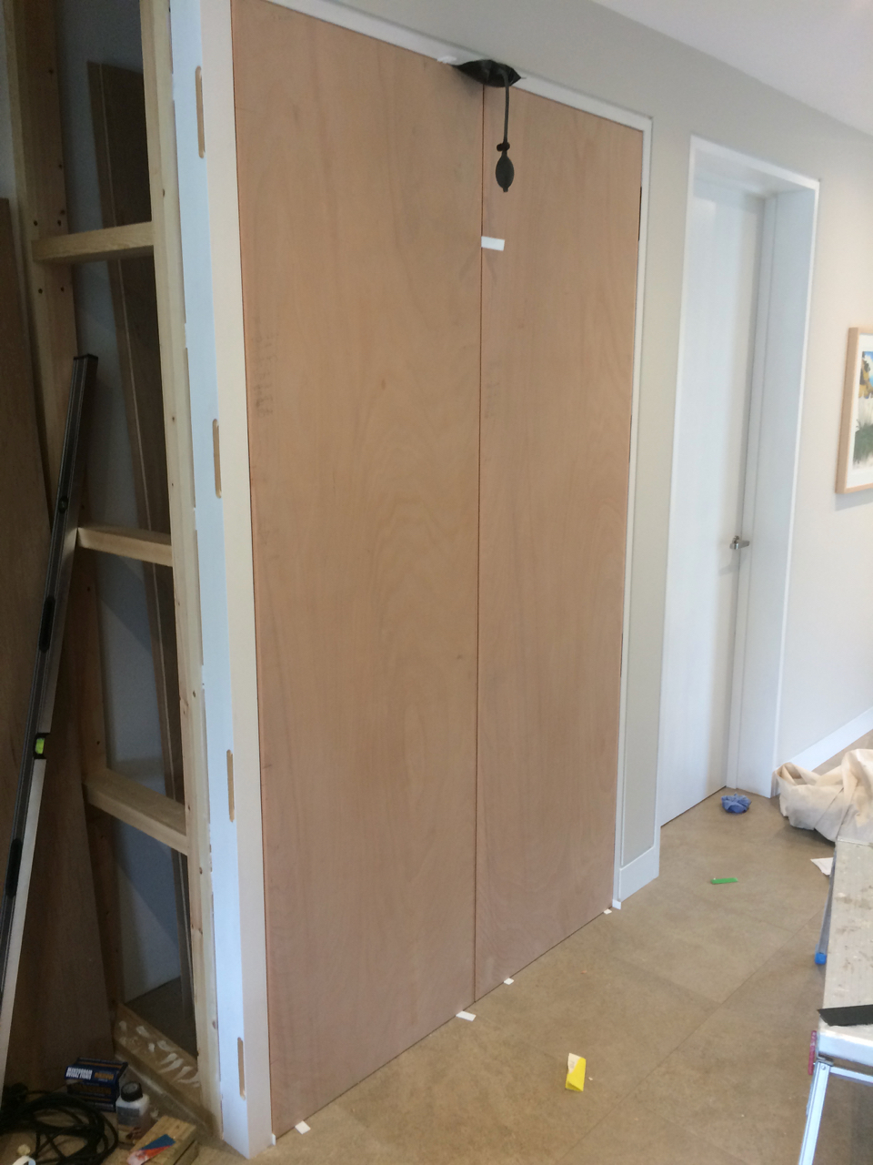 Storage cupboard flush doors