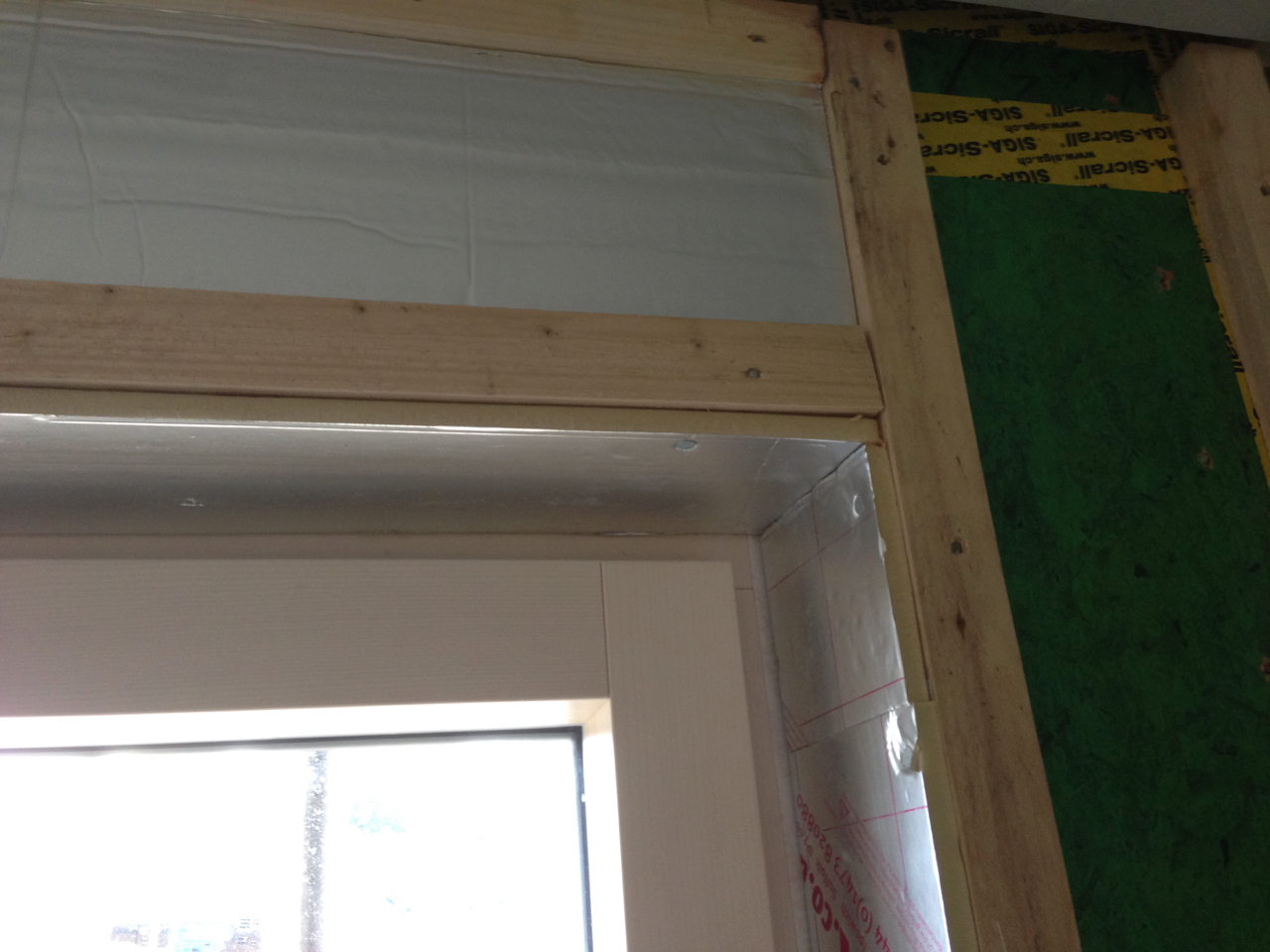 Insulation around window reveals