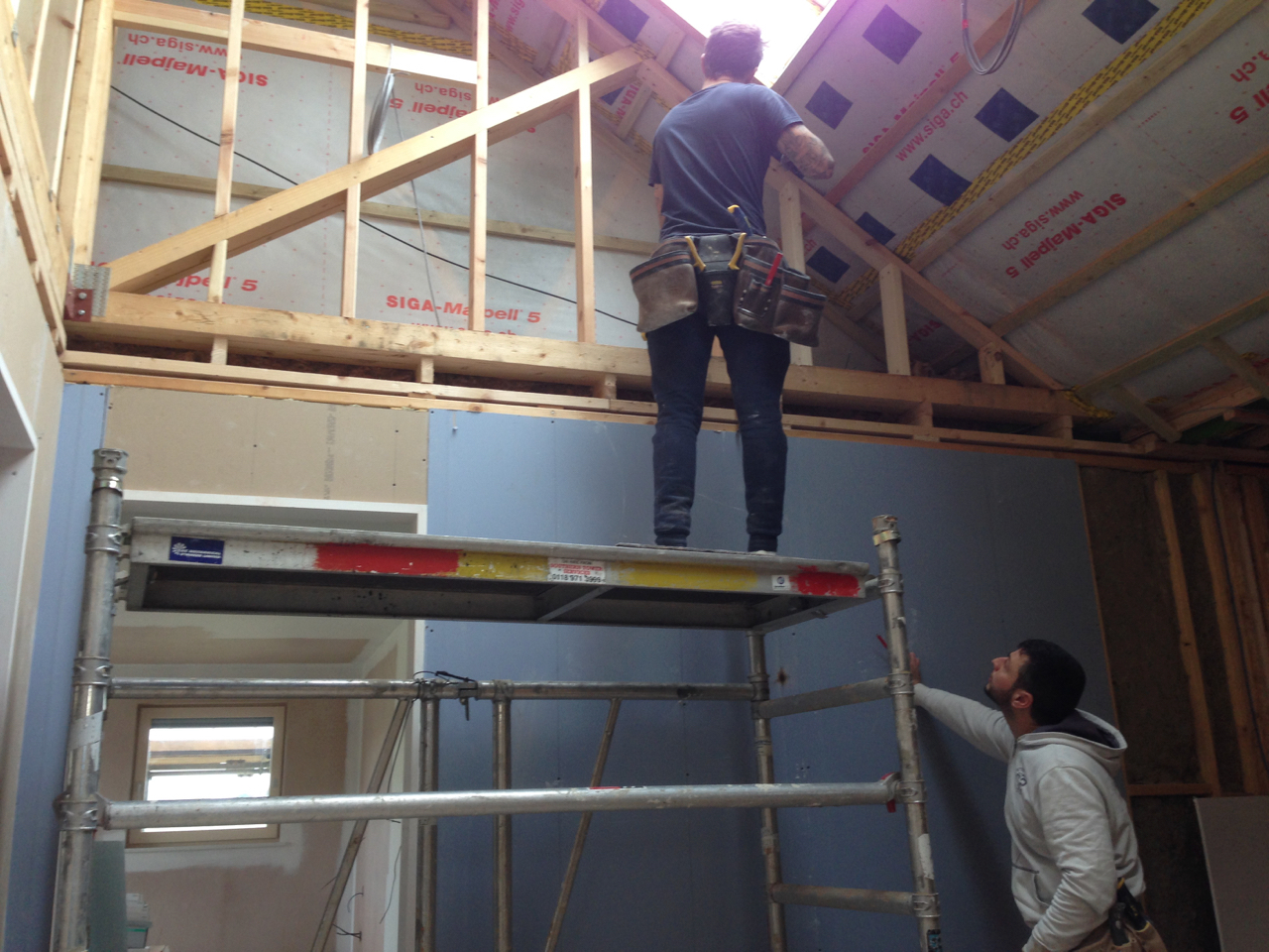 Fixing plasterboard above the landing