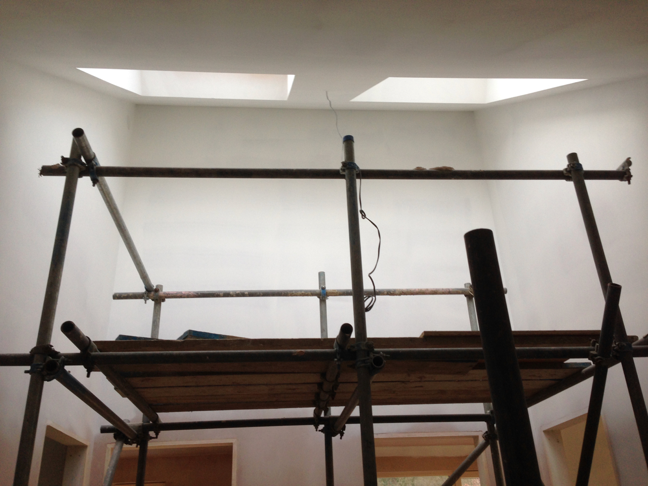 Scaffold to spray second floor ceiling