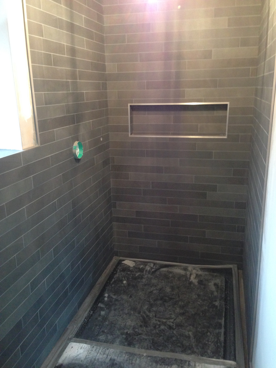 Finished wet room shower tiles